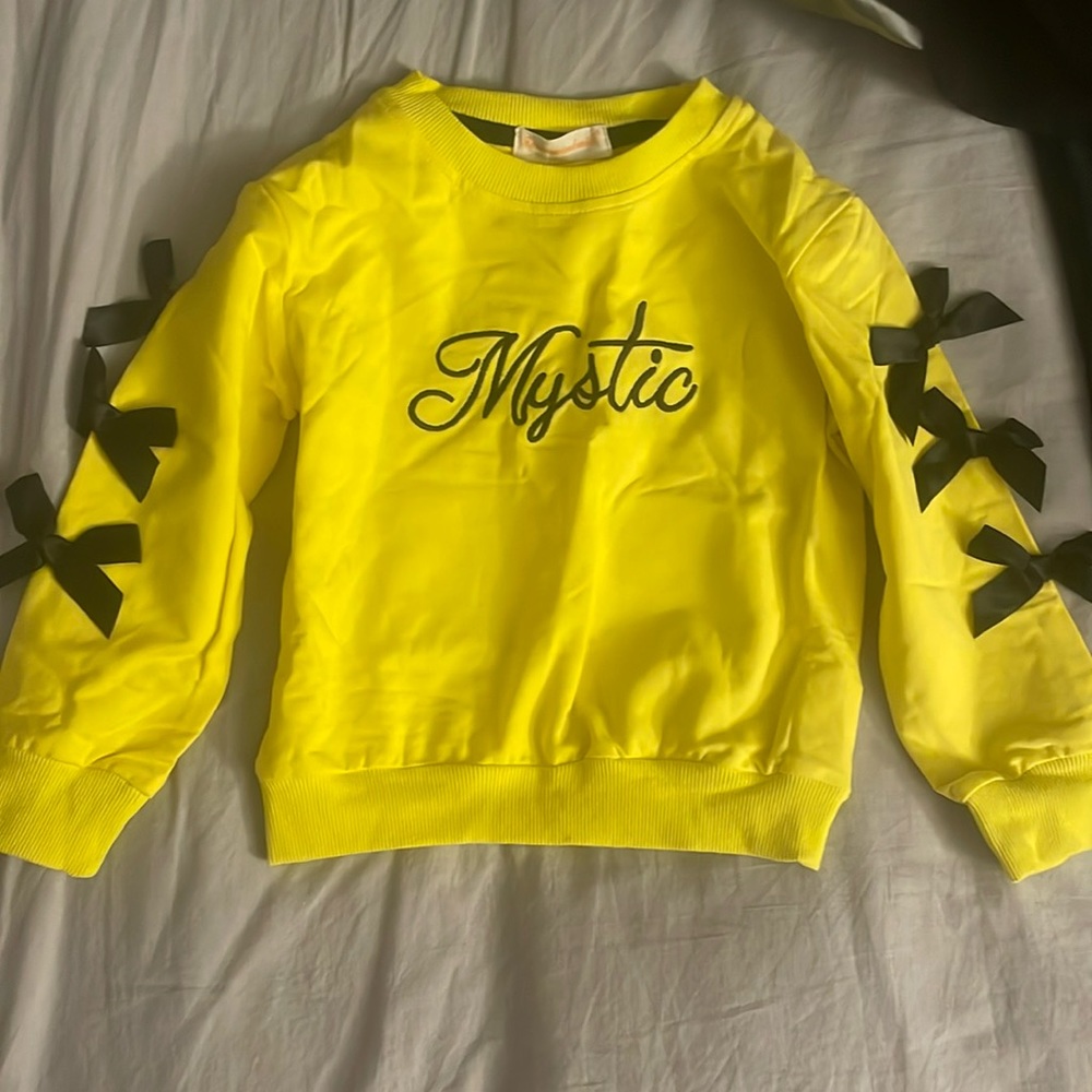 Young girls youth sweater with ribbons on sleeves
